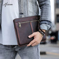 Brown leather laptop sleeve